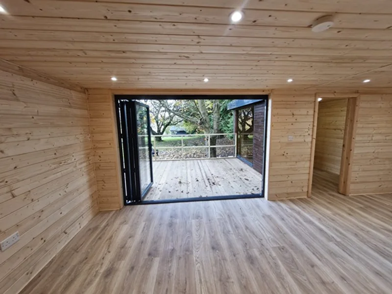 Team fitting SIPs panels on site